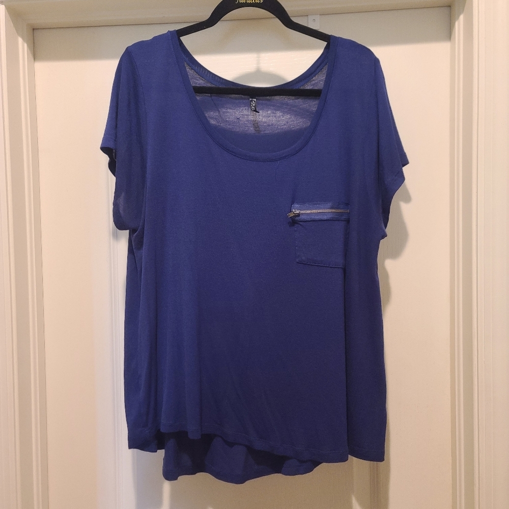 Blue top with zipper detail on pocket